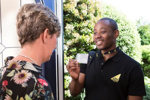 boiler servicing - boiler engineer showing their gas safe registration identification