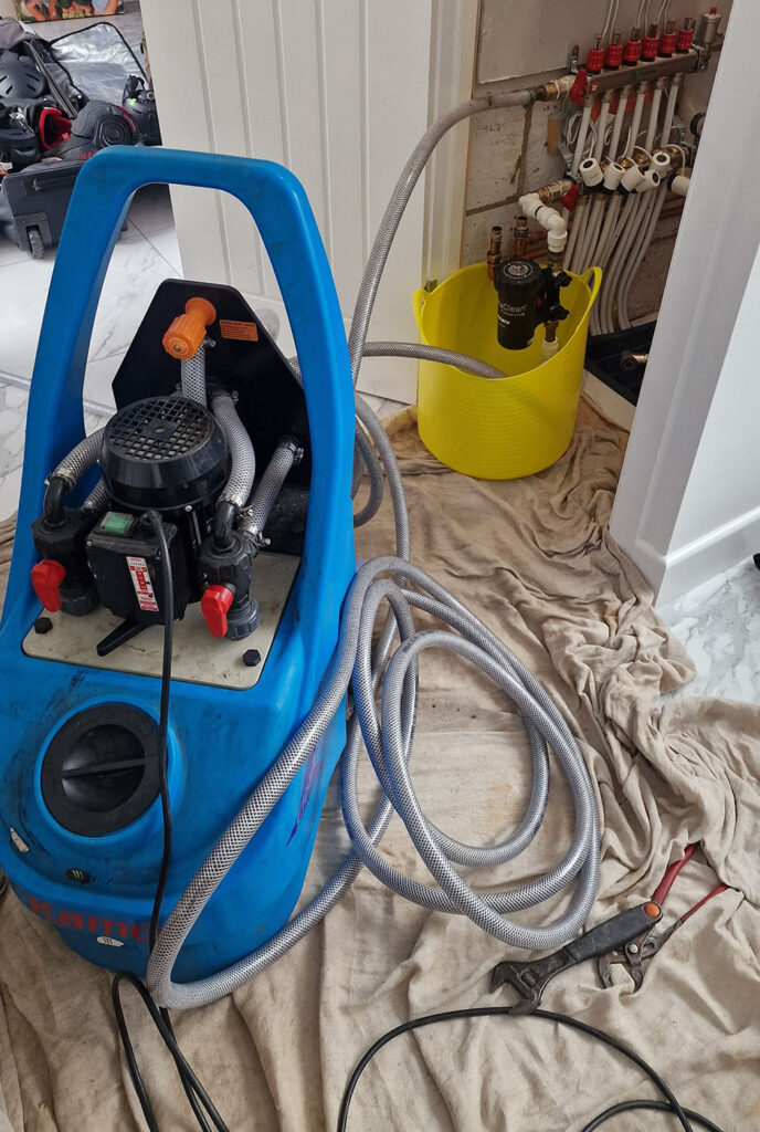 The Benefits of a Central Heating Power Flush - this image shows a power flush of underfloor heating in milton keynes