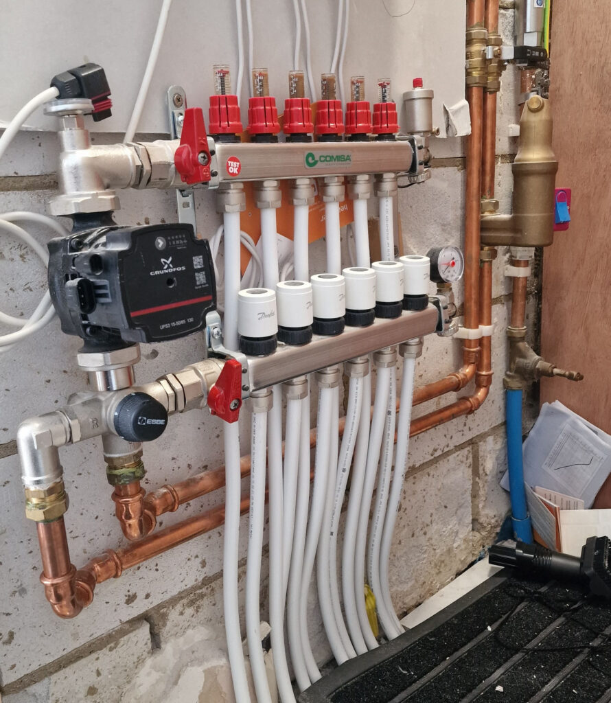 The Benefits of a Central Heating Power Flush - this image shows a central heating power flush service in a Milton keynes home