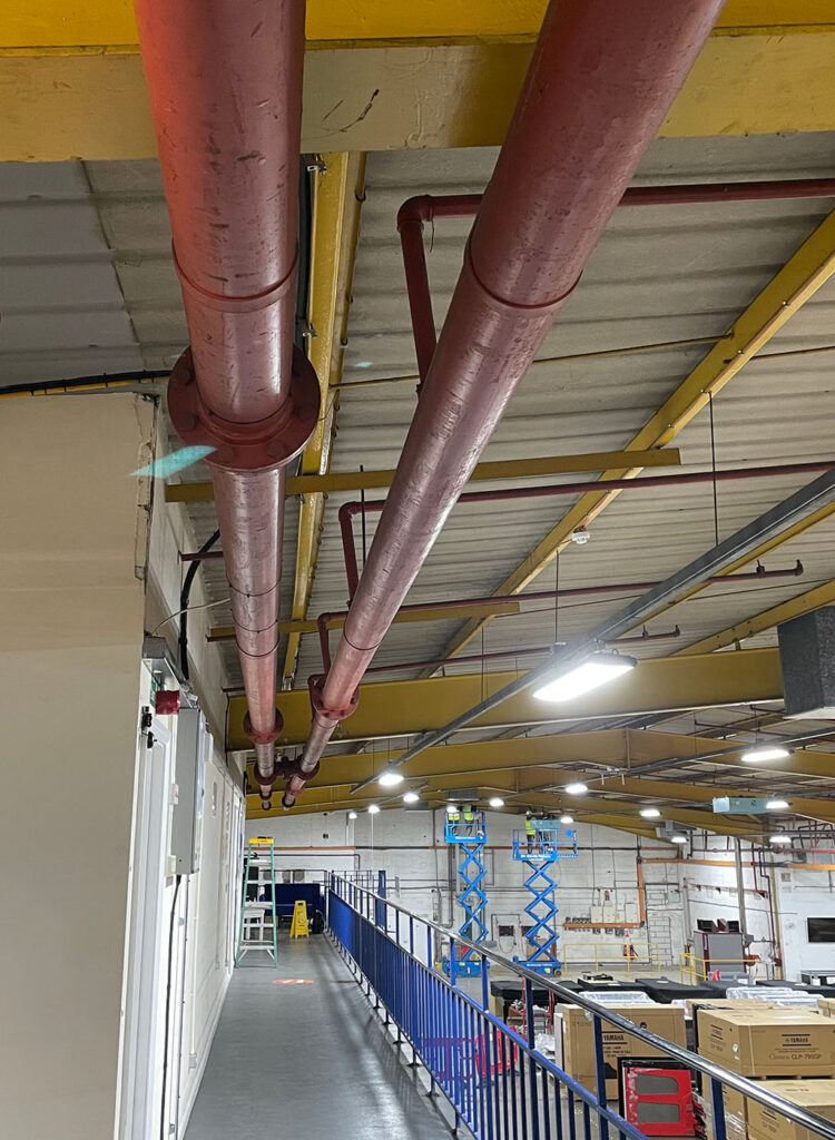 How Yamaha Improved Efficiency with a Heating System Upgrade - this image shows the yamaha building in Milton Keynes - this image shows some of the pipework
