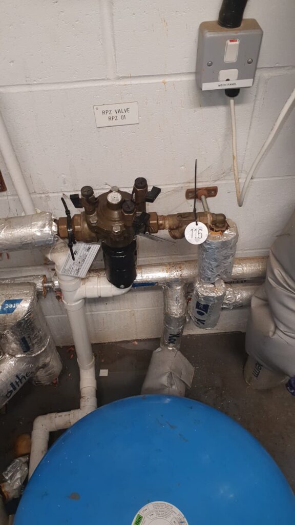 RPZ Valve testing 2, this image shows an RPZ valve and pipes with lagging on