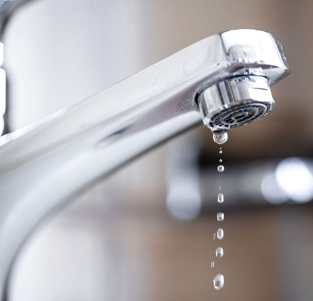 Preparing for the Christmas Shutdown - Essential Plumbing & Heating Tips for Your Business this image shows a dripping tap