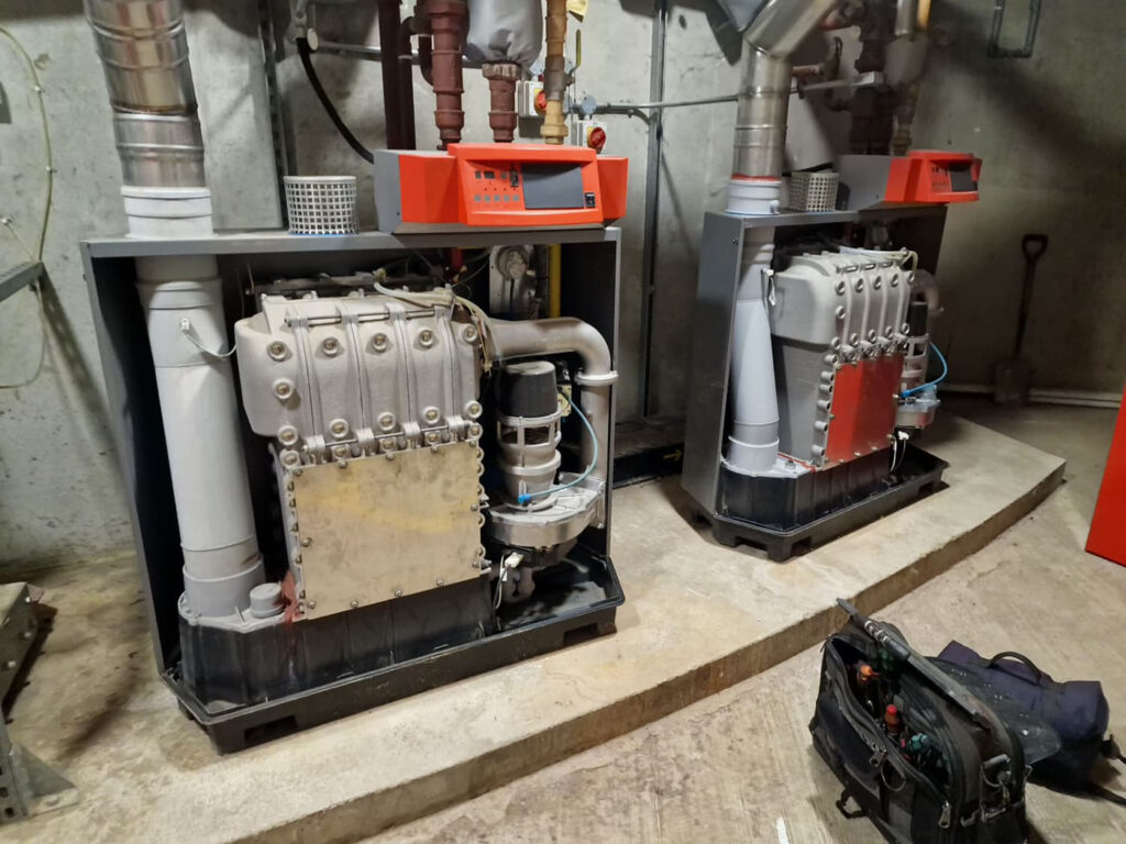 Commercial heating plant with industrial boilers and pipework maintained by Plumbing & Gas Solutions for Facilities Management buildings.