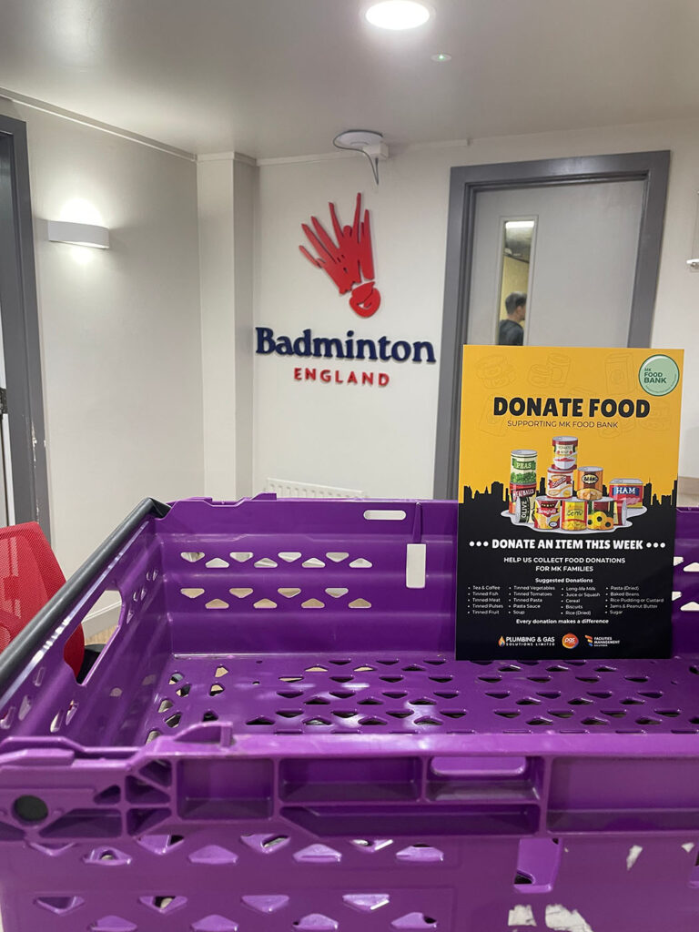 PGS Group MK Food Bank donation crate placed at Badminton England site in Milton Keynes ready for staff and visitors to contribute food donations