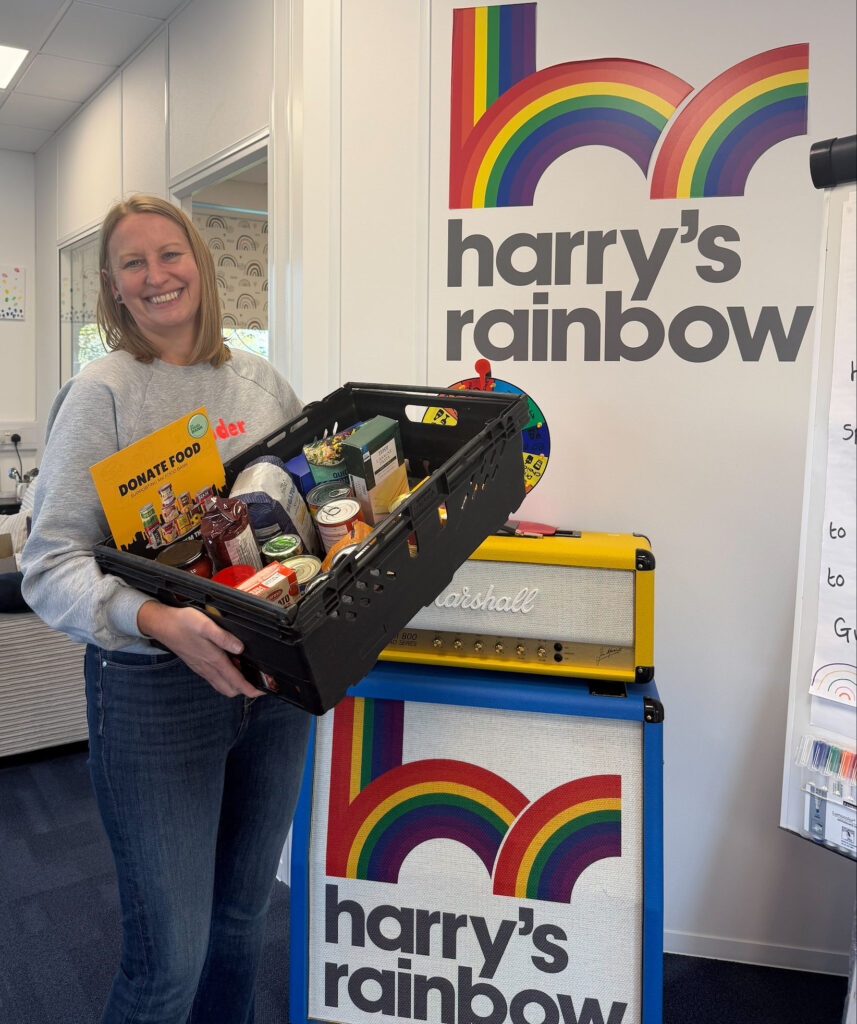 Harry’s Rainbow charity team with full MK Food Bank donation crate collected as part of PGS Group campaign in Milton Keynes