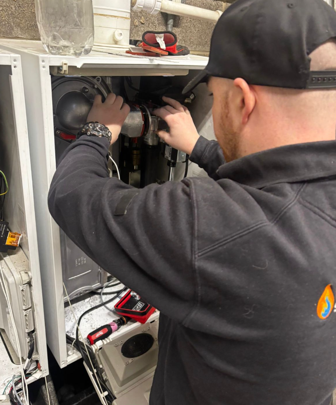 Kellan performing servicing works
